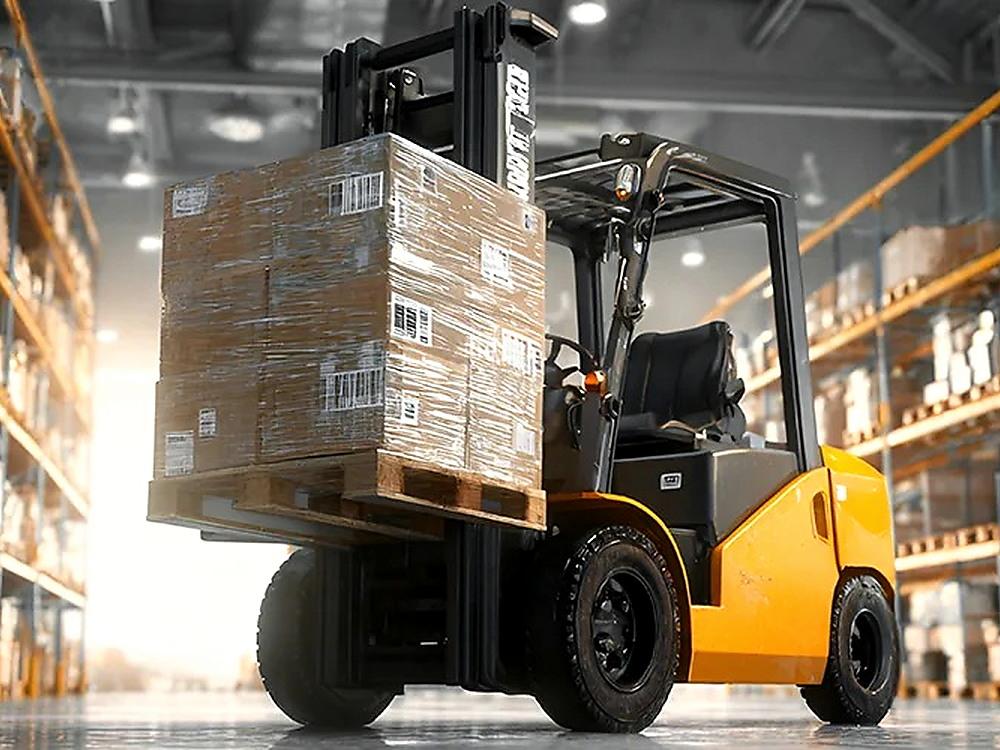 Warehouse forklift carrying pallet load with JABIL solid tyres